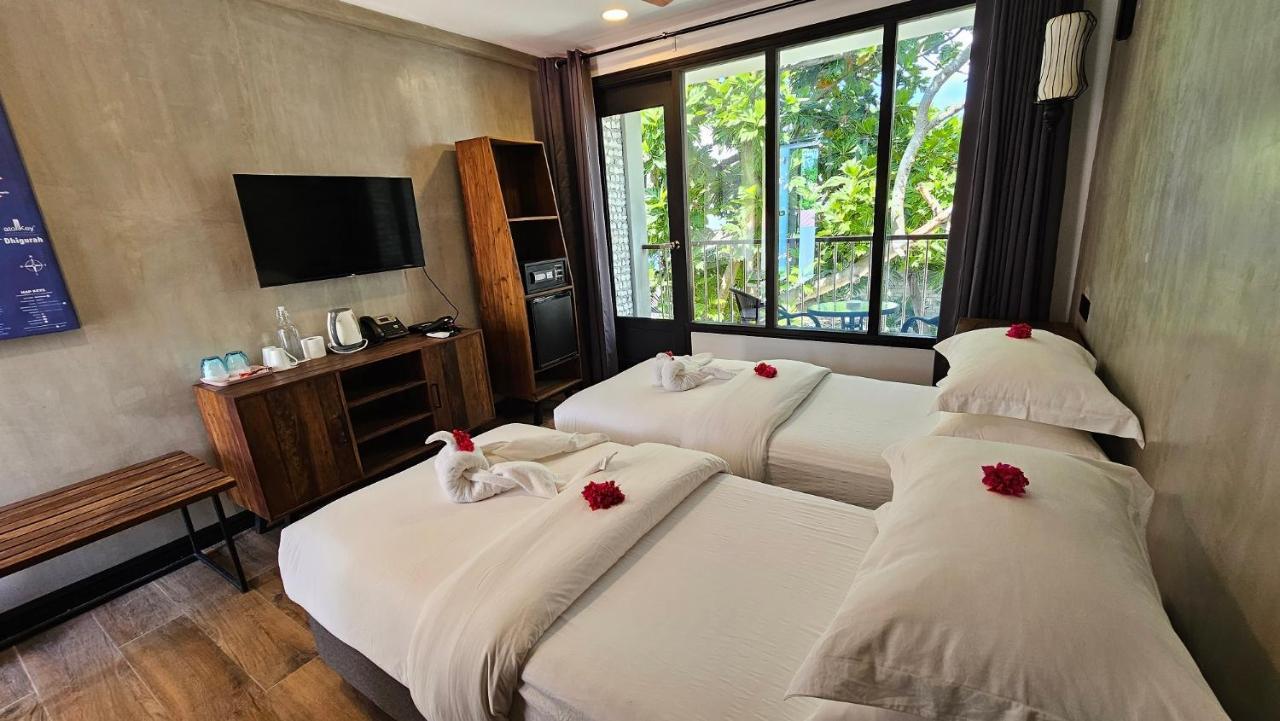Dhigurah Cottage Exteriör bild